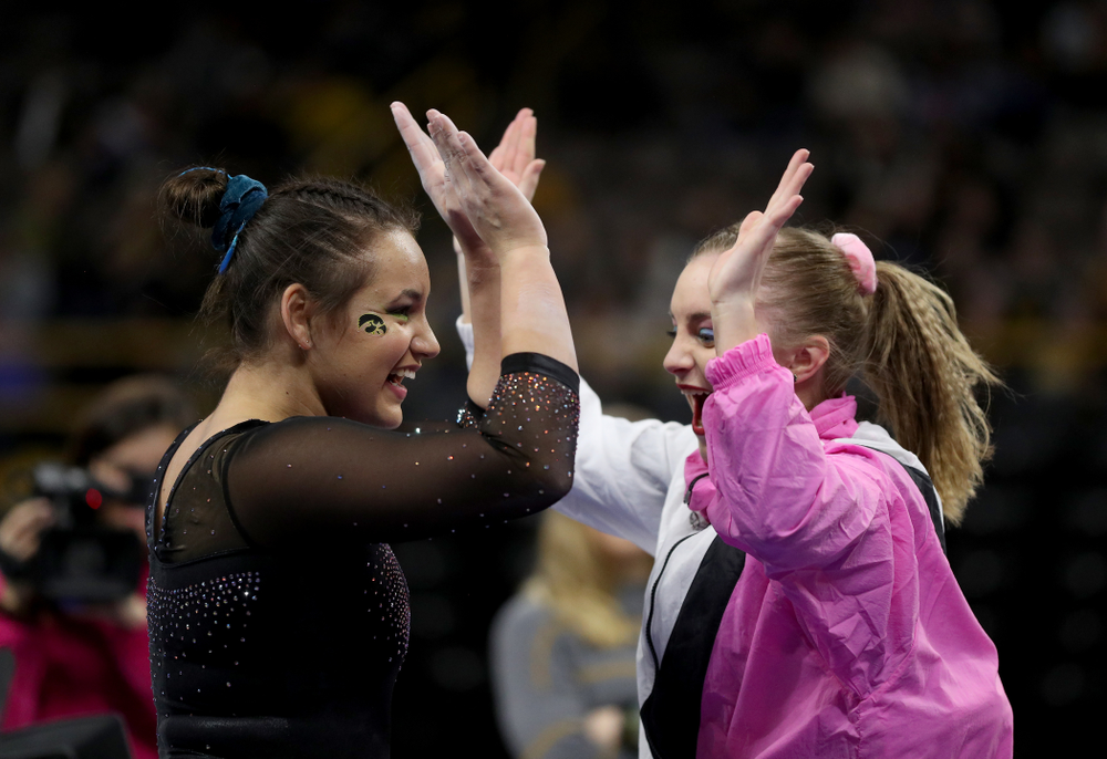 Iowa’s Dani Castillo competes on the beam against Michigan Friday, February 14, 2020 at Carver-Hawkeye Arena. (Brian Ray/hawkeyesports.com)