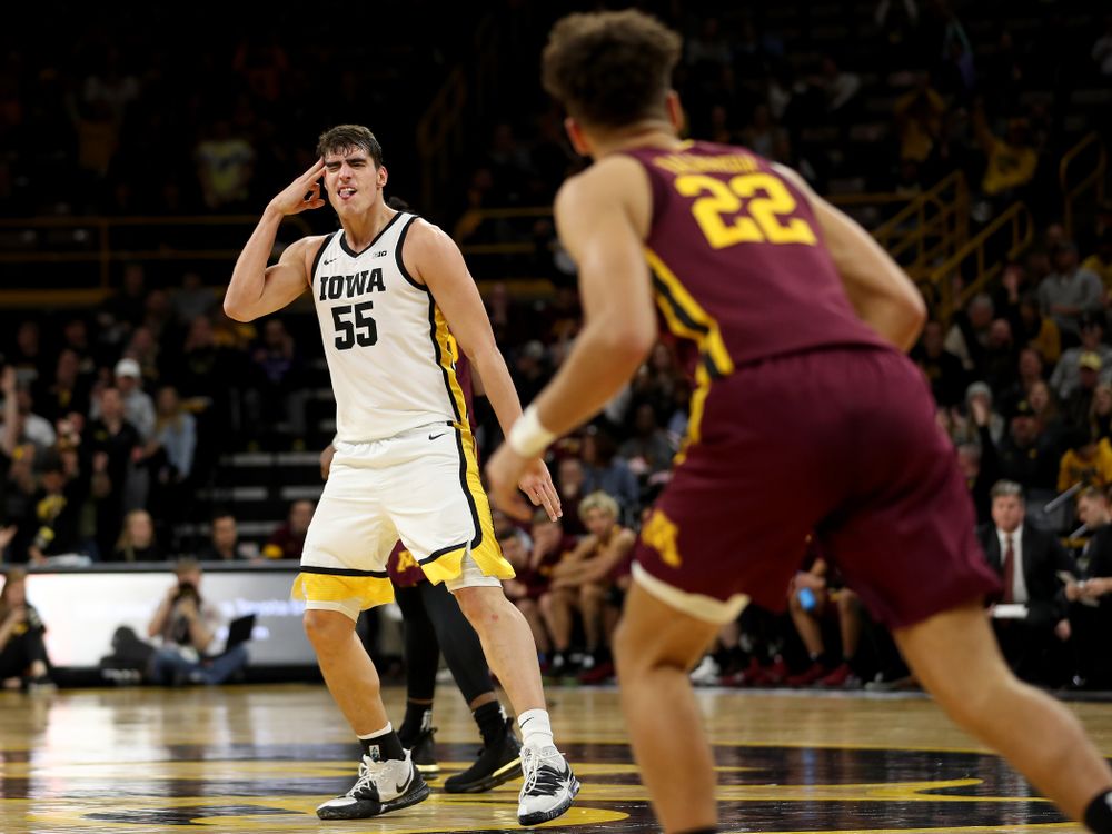 Iowa Hawkeyes forward Luka Garza (55) celebrates a three point basket against the Minnesota Golden Gophers Monday, December 9, 2019 at Carver-Hawkeye Arena. (Brian Ray/hawkeyesports.com)