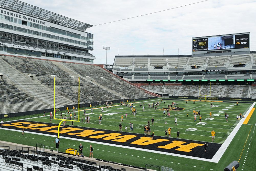 Junior Hawk Club members participate in the Swarm Experience during Kids Day at Kinnick Stadium in Iowa City on Saturday, Aug 10, 2019. (Stephen Mally/hawkeyesports.com)