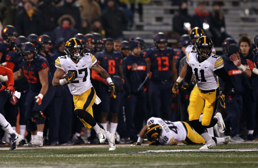 Iowa Hawkeyes defensive back Amani Hooker (27) intercepts a pass against the Illinois Fighting Illini Saturday, November 17, 2018 at Memorial Stadium in Champaign, Ill. (Brian Ray/hawkeyesports.com)