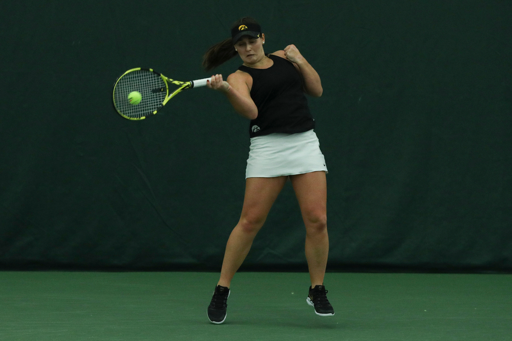 Iowa’s Danielle Bauers returns a hit during the Iowa women’s tennis meet vs DePaul on Friday, February 21, 2020 at the Hawkeye Tennis and Recreation Complex. (Lily Smith/hawkeyesports.com)