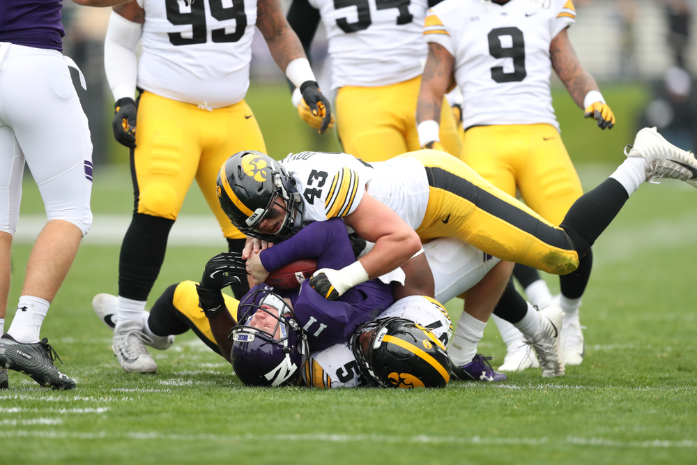 Iowa Hawkeyes linebacker Dillon Doyle (43) and defensive end Chauncey Golston (57) against the Northwestern Wildcats Saturday, September 28, 2019 at Kinnick Stadium. (Max Allen/hawkeyesports.com)