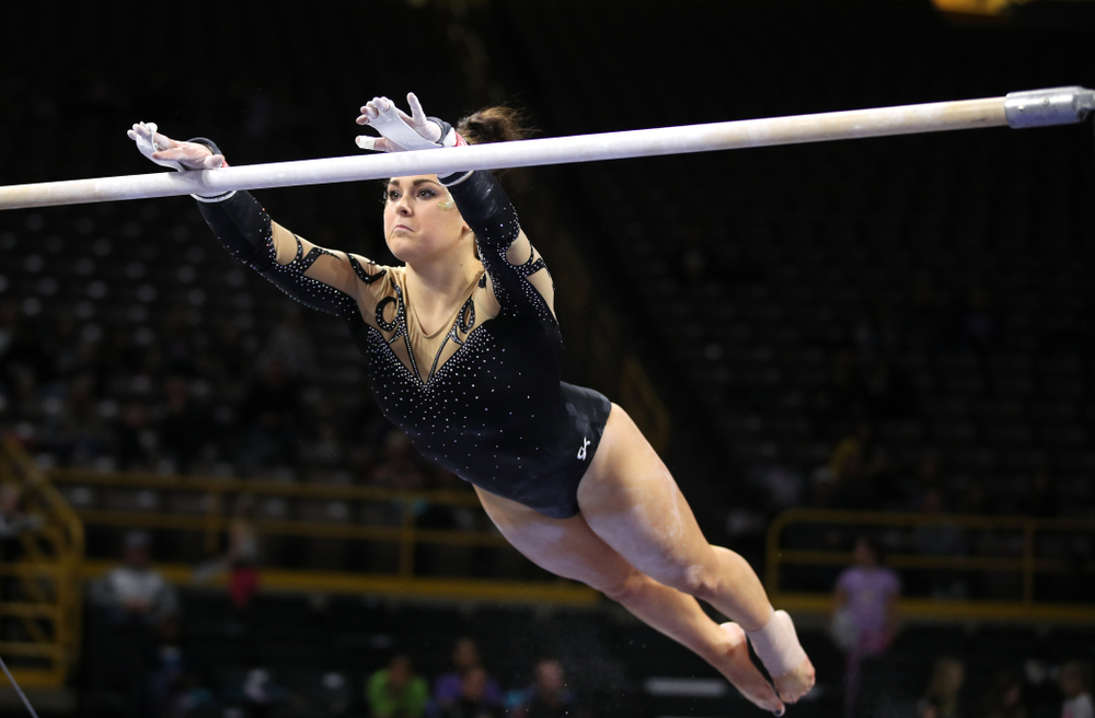 Iowa's Erin Castle competes on the bars during their meet against Southeast Missouri State Friday, January 11, 2019 at Carver-Hawkeye Arena. (Brian Ray/hawkeyesports.com)