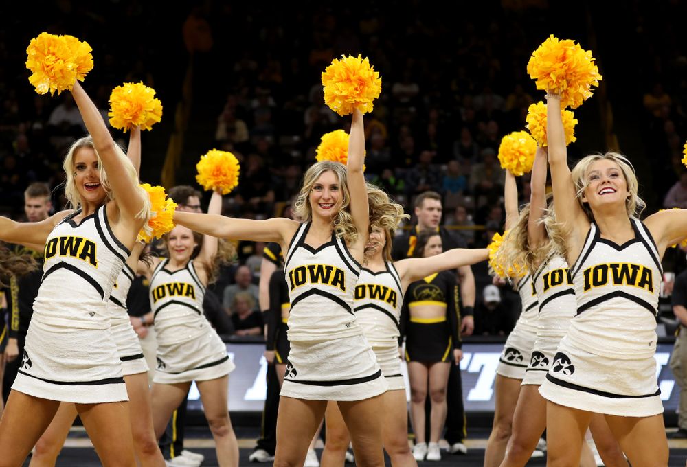 The Iowa Cheerleaders and Dance Team perform on senior night at half-time of the Iowa Hawkeyes game against the Purdue Boilermakers Tuesday, March 3, 2020 at Carver-Hawkeye Arena. (Brian Ray/hawkeyesports.com)