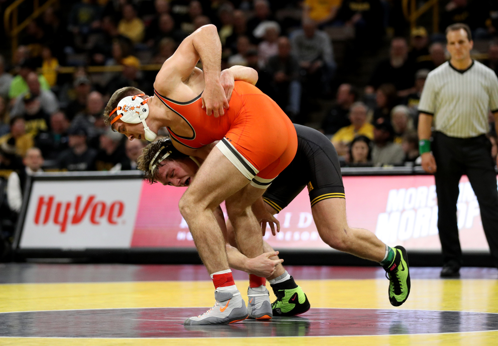 Iowa’s Jacob Warner wrestles Oklahoma State’s Dakota Geer at 197 pounds Sunday, February 23, 2020 at Carver-Hawkeye Arena. Warner won the match 8-3. (Brian Ray/hawkeyesports.com)
