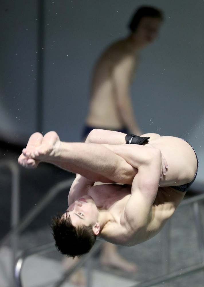 IowaÕs Michael Huebner competes on the 1 meter springboard against Notre Dame and Illinois Saturday, January 11, 2020 at the Campus Recreation and Wellness Center. (Brian Ray/hawkeyesports.com)