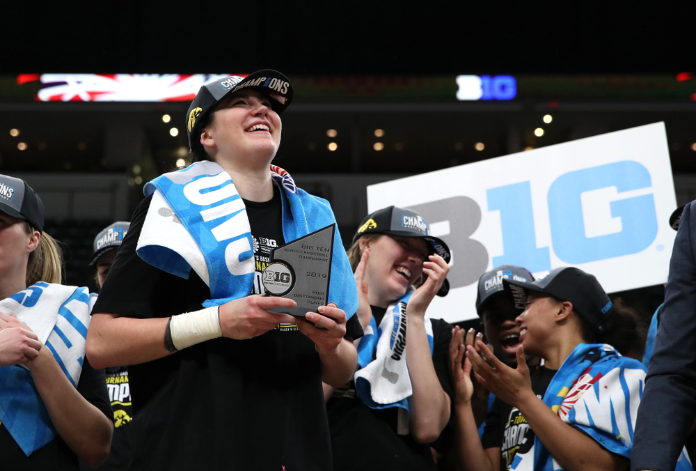 Iowa Hawkeyes forward Megan Gustafson (10) receives the Most Outstanding Player Award following their win against the Maryland Terrapins Sunday, March 10, 2019 at Bankers Life Fieldhouse in Indianapolis, Ind. (Brian Ray/hawkeyesports.com)