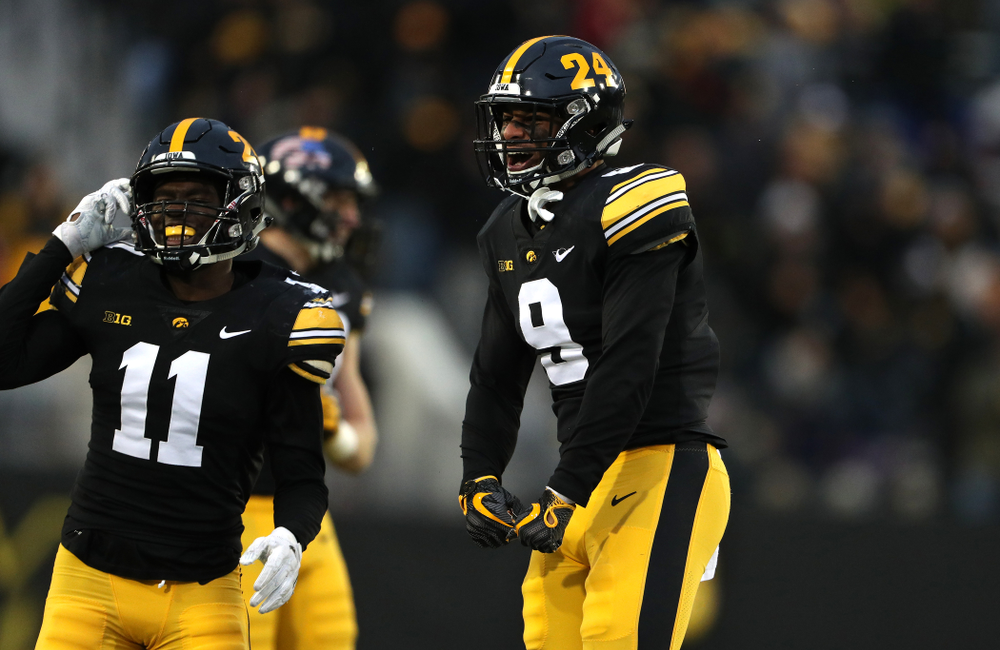 Iowa Hawkeyes defensive back Geno Stone (9) intercepts a pass against the Northwestern Wildcats Saturday, November 10, 2018 at Kinnick Stadium. (Brian Ray/hawkeyesports.com)
