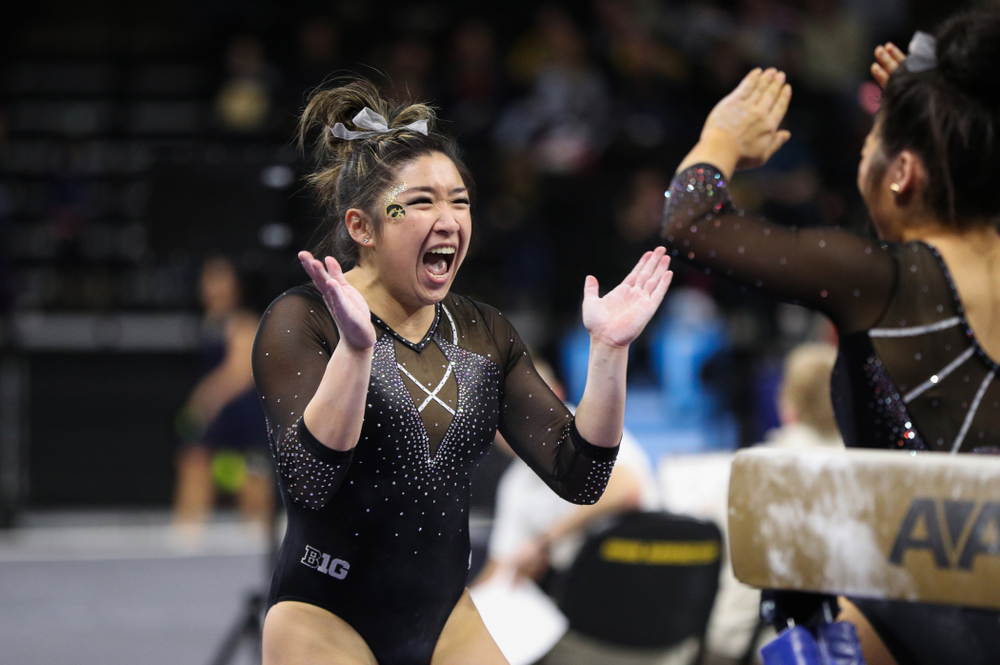 Iowa's Nicole Chow competes on the beem against Illinois Saturday, February 16, 2019 at Carver-Hawkeye Arena. (Brian Ray/hawkeyesports.com)