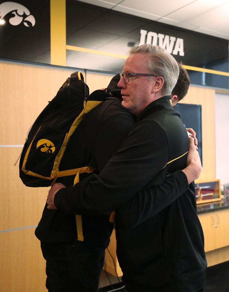 Iowa Hawkeyes head coach Fran McCaffery tells forward Luka Garza (55) that he has been named the Big Ten Player of the Year Monday, March 9, 2020 at Carver-Hawkeye Arena. (Brian Ray/hawkeyesports.com)