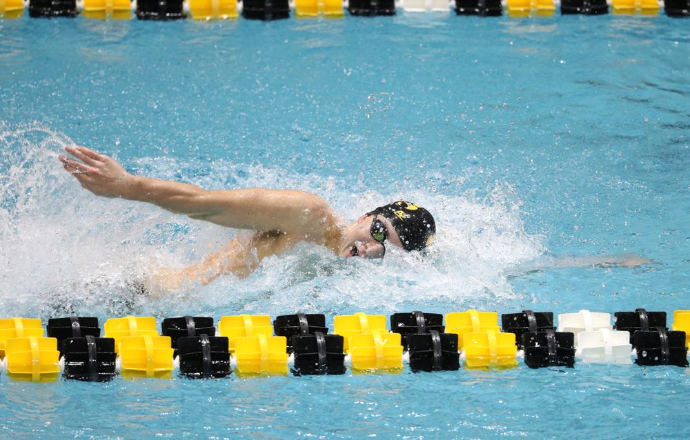 Iowa's Michael Tenney swims the third leg of the 800 freestyle relay at the 2019 Big Ten Swimming and Diving meet Wednesday, February 27, 2019 at the Campus Wellness and Recreation Center. (Brian Ray/hawkeyesports.com)