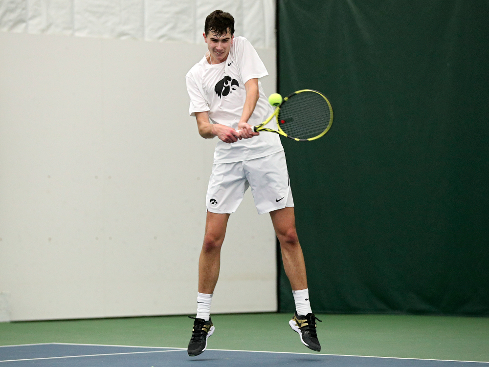 Iowa’s Matt Clegg returns a shot during his doubles match at the Hawkeye Tennis and Recreation Complex in Iowa City on Sunday, February 16, 2020. (Stephen Mally/hawkeyesports.com)