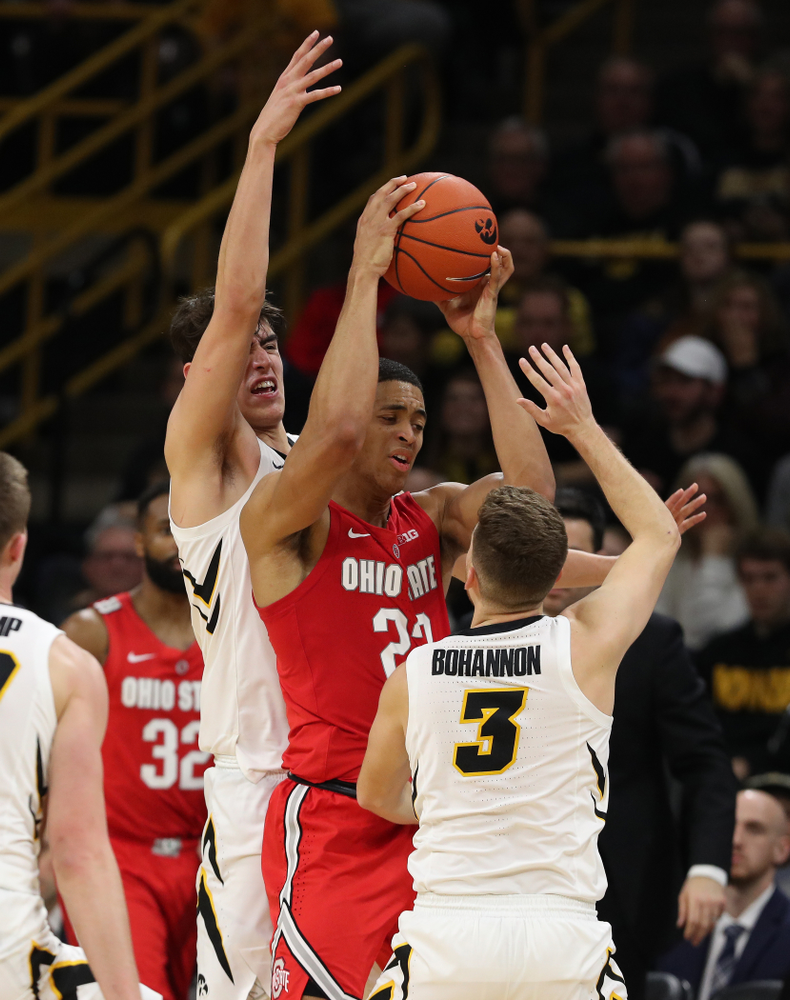 Iowa Hawkeyes forward Luka Garza (55) and guard Jordan Bohannon (3) against the Ohio State Buckeyes Saturday, January 12, 2019 at Carver-Hawkeye Arena. (Brian Ray/hawkeyesports.com)