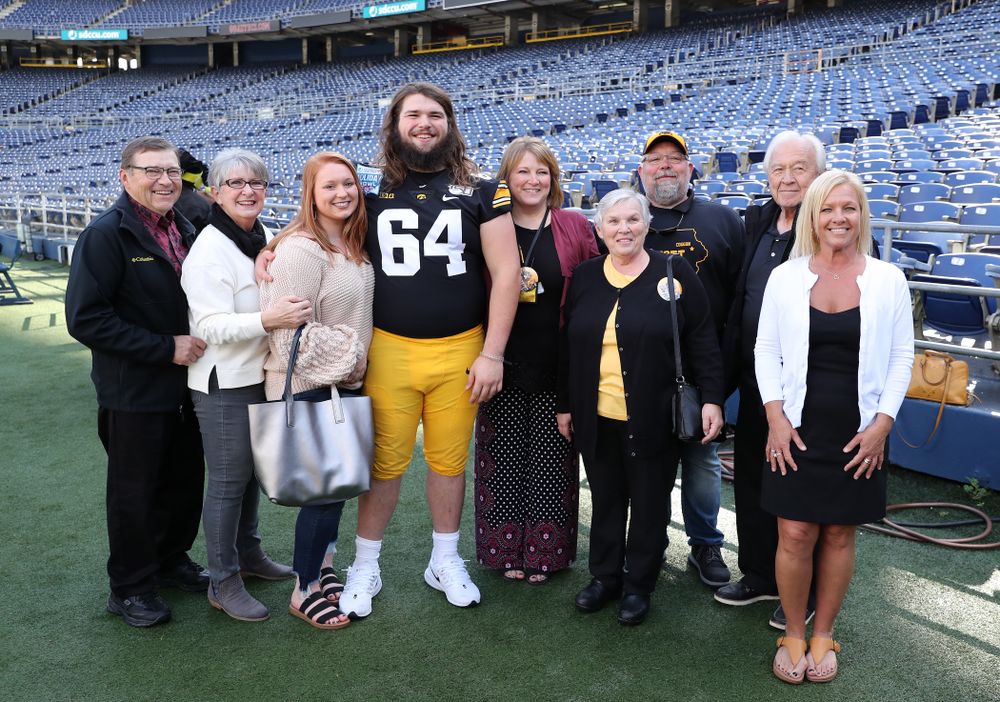 Iowa Hawkeyes offensive lineman Kyler Schott (64) following the team photo Wednesday, December 25, 2019 at SDCCU Stadium in San Diego. (Brian Ray/hawkeyesports.com)