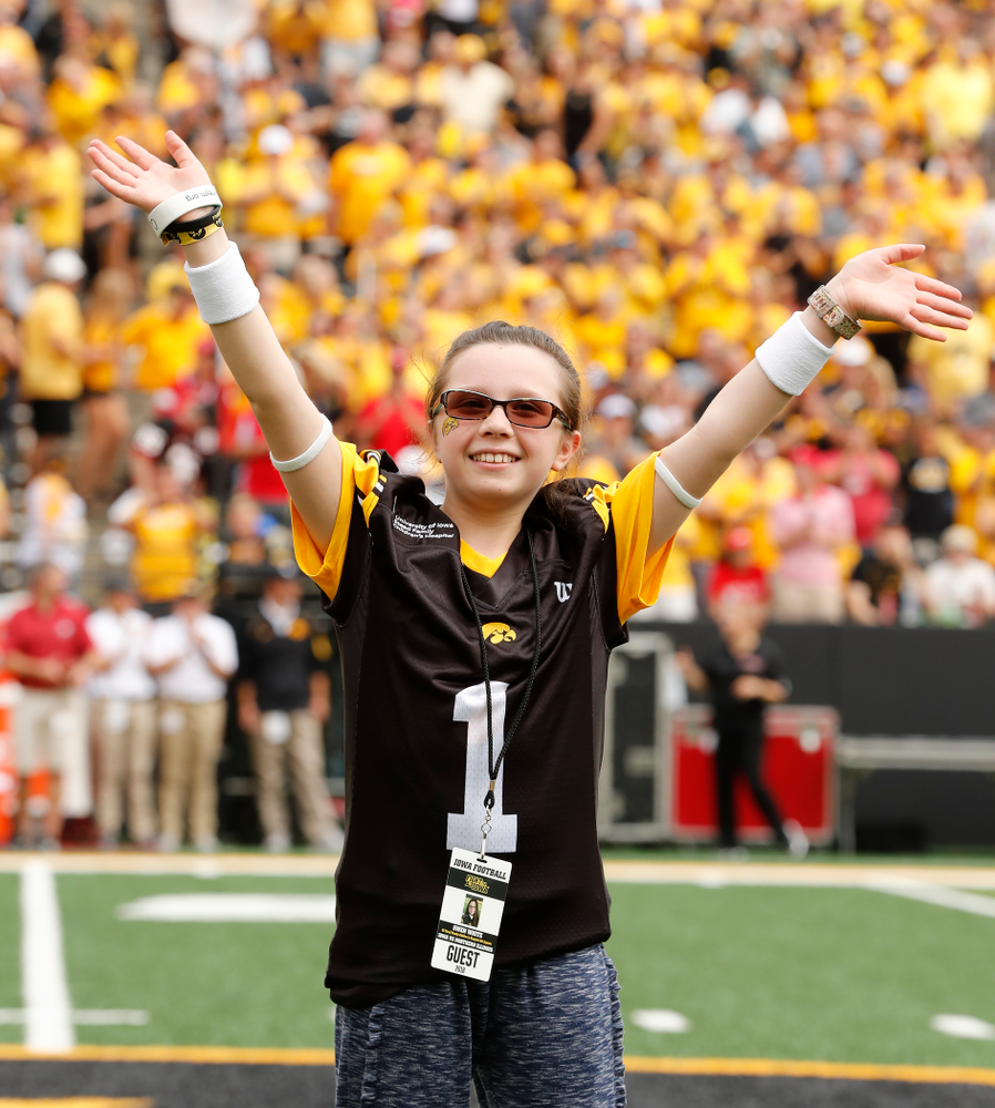 Honorary Captain Julian Vandervelde and the kid captain against the Northern Illinois Huskies Saturday, September 1, 2018 at Kinnick Stadium. (Brian Ray/hawkeyesports.com)