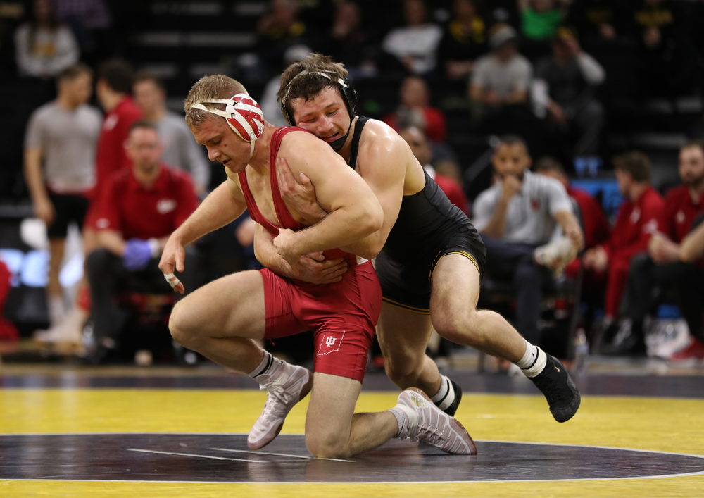 Iowa's Jaren Glosser wrestles Indiana's Jake Danishek at 157 pounds Friday, February 15, 2019 at Carver-Hawkeye Arena. (Brian Ray/hawkeyesports.com)