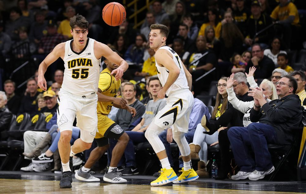 Iowa Hawkeyes forward Luka Garza (55) chases down a loose ball during a game against Alabama State at Carver-Hawkeye Arena on November 21, 2018. (Tork Mason/hawkeyesports.com)
