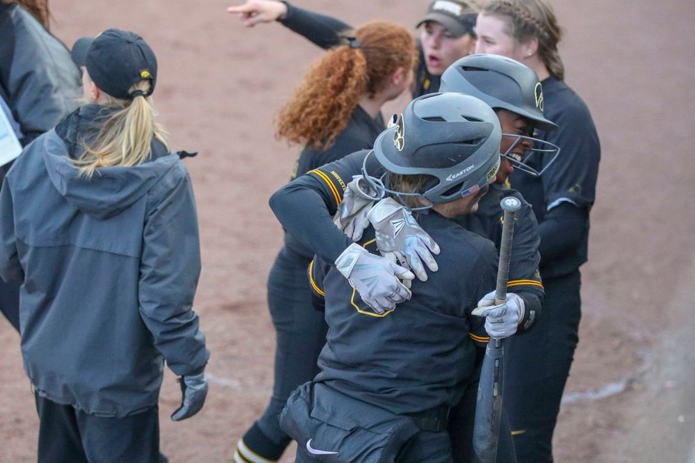 IowaÕs Donirae Mayhew (24) and Iowa catcher Abby Lien (9) at softball vs Illinois game 3 on Saturday, April 13, 2019 at Bob Pearl Field. (Lily Smith/hawkeyesports.com)
