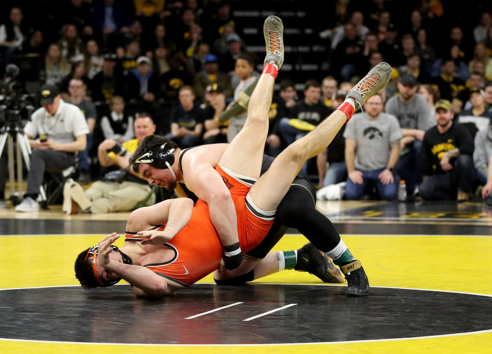 Iowa’s Tony Cassioppi wrestles Oklahoma State’s Auston Harris at heavyweight Sunday, February 23, 2020 at Carver-Hawkeye Arena. Cassioppi won the match 11-1. (Brian Ray/hawkeyesports.com)
