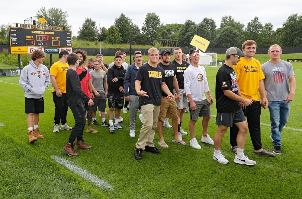Student-athletes walk in the Parade of Champions during the Student-Athlete Kickoff at the Iowa Soccer Complex in Iowa City on Sunday, Aug 25, 2019. (Stephen Mally/hawkeyesports.com)