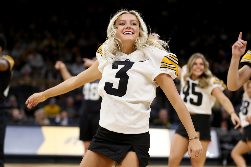 Members of the Hawkeye Football team performs with the Iowa Dance Team at halftime of the Iowa Hawkeyes game against the Ohio State Buckeyes Thursday, February 20, 2020 at Carver-Hawkeye Arena. (Brian Ray/hawkeyesports.com)