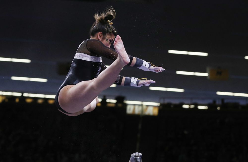 Iowa's Nicole Chowl competes on the bars against the Rutgers Scarlet Knights Saturday, January 26, 2019 at Carver-Hawkeye Arena. (Brian Ray/hawkeyesports.com)