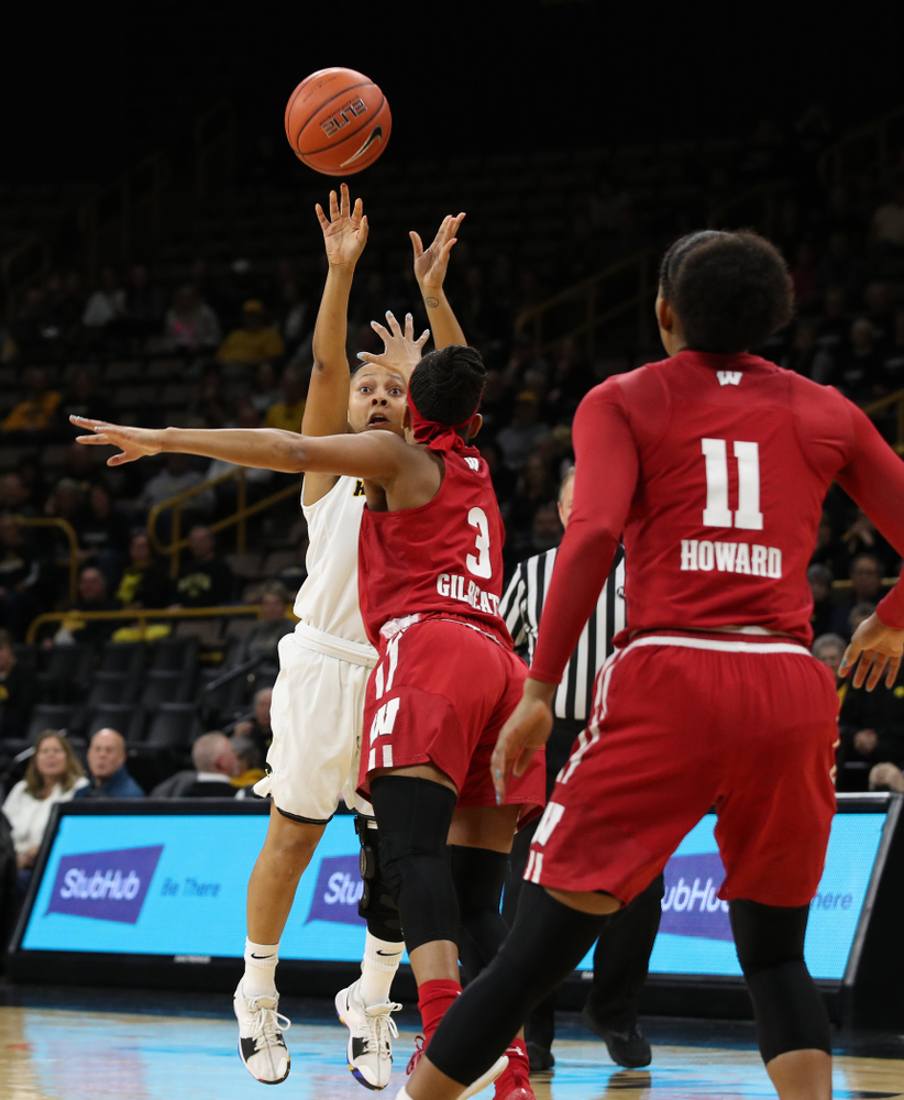 Iowa Hawkeyes guard Tania Davis (11) against the Wisconsin Badgers Monday, January 7, 2019 at Carver-Hawkeye Arena. (Brian Ray/hawkeyesports.com)