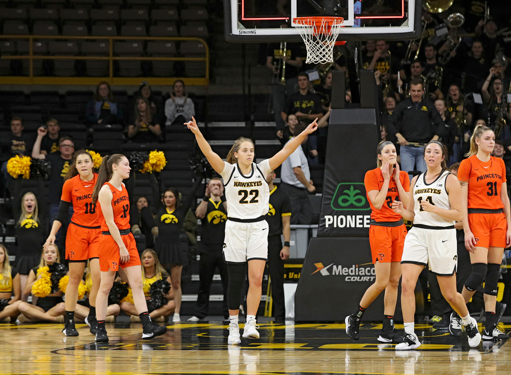Iowa guard Kathleen Doyle (22) raises her hands during overtime in their win against Princeton at Carver-Hawkeye Arena in Iowa City on Wednesday, Nov 20, 2019. (Stephen Mally/hawkeyesports.com)