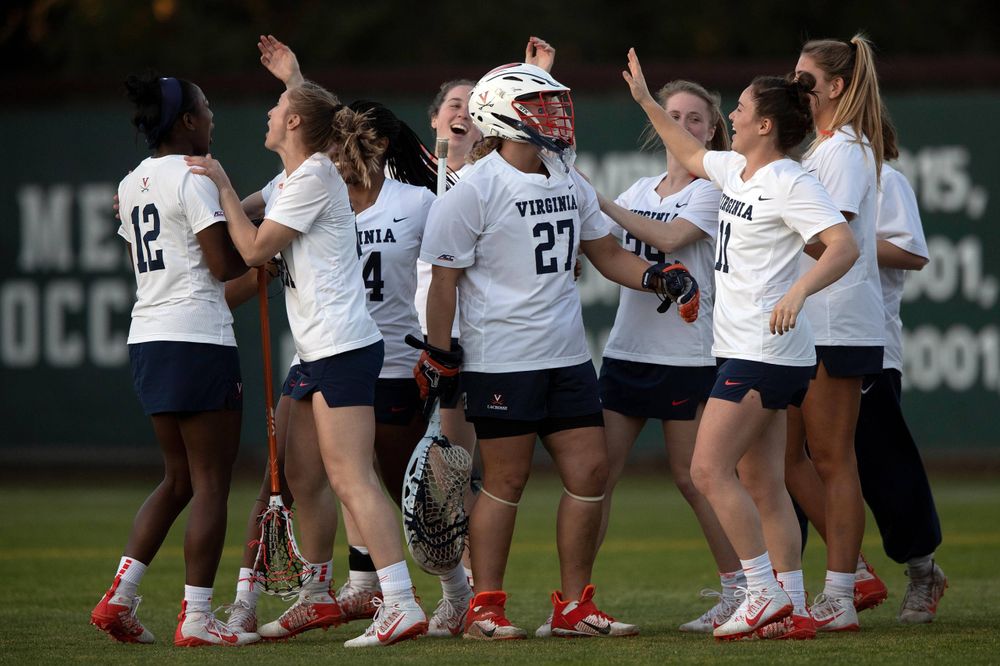 STANFORD, California - FEBRUARY 14: Virginia Cavaliers goalkeeper Charlie Campbell (27) celebrates with teammates after the game against the Stanford Cardinal at Cagan Stadium on February 14, 2020 in Stanford, California. The Virginia Cavaliers defeated the Stanford Cardinal 12-11. (Photo by Jason O. Watson)