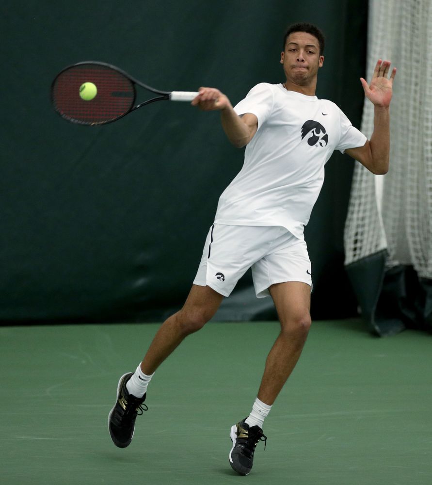 Iowa’s Oliver Okonkwo against Cornell Sunday, March 8, 2020 at the Hawkeye Tennis and Recreation Center. (Brian Ray/hawkeyesports.com)