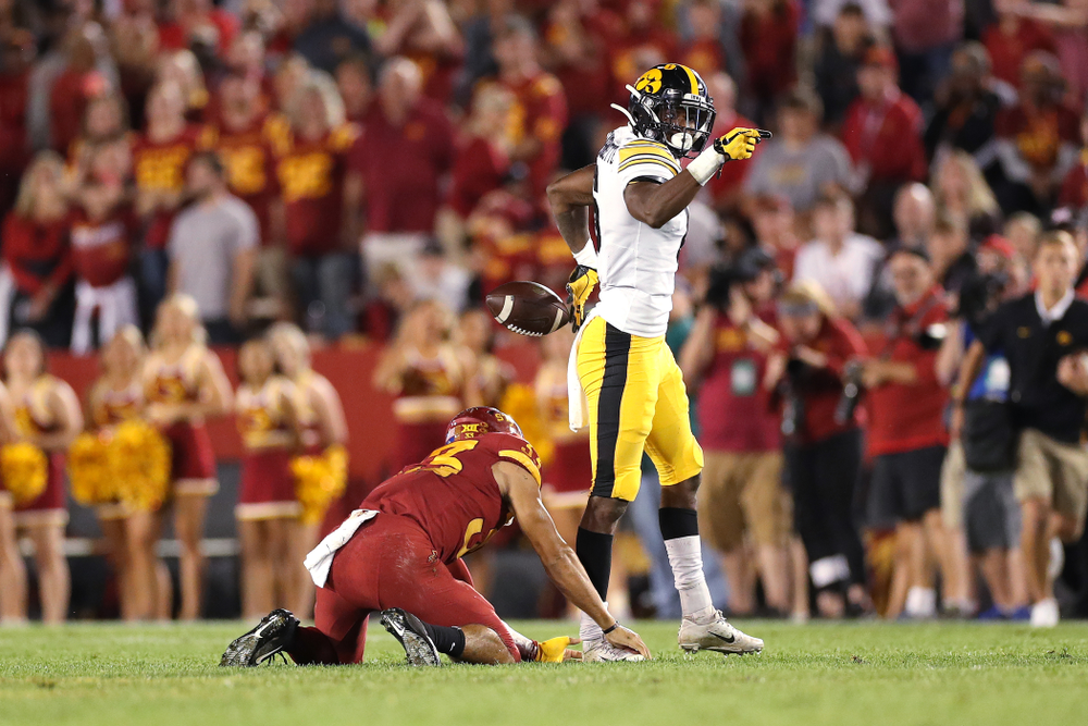 Iowa Hawkeyes wide receiver Ihmir Smith-Marsette (6) signals for a first down against the Iowa State Cyclones Saturday, September 14, 2019 in Ames, Iowa. (Brian Ray/hawkeyesports.com)