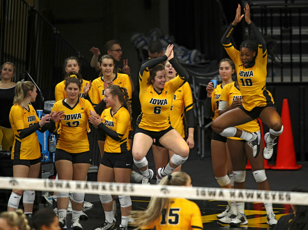 Iowa’s Emma Lowes (6) and Griere Hughes (10) celebrate during their match at Carver-Hawkeye Arena in Iowa City on Sunday, Oct 20, 2019. (Stephen Mally/hawkeyesports.com)