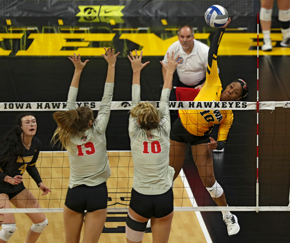 Iowa’s Griere Hughes (10) gets up for a kill during the second set of their match at Carver-Hawkeye Arena in Iowa City on Friday, Nov 29, 2019. (Stephen Mally/hawkeyesports.com)