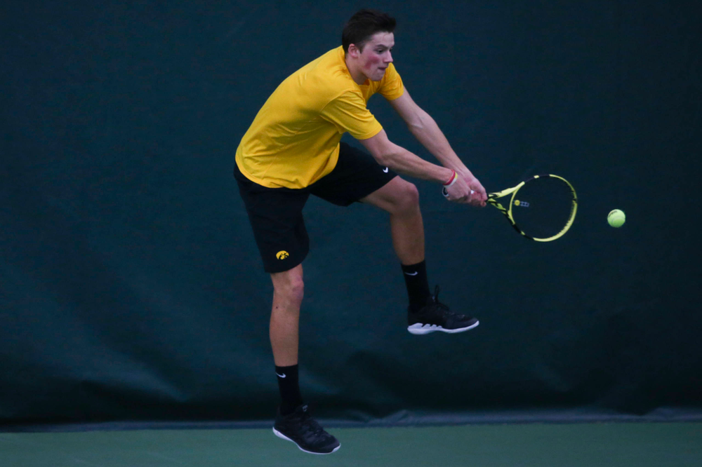Iowa's Piotr Smietana at a tennis match vs Drake Friday, March 8, 2019 at the Hawkeye Tennis and Recreation Complex. (Lily Smith/hawkeyesports.com)