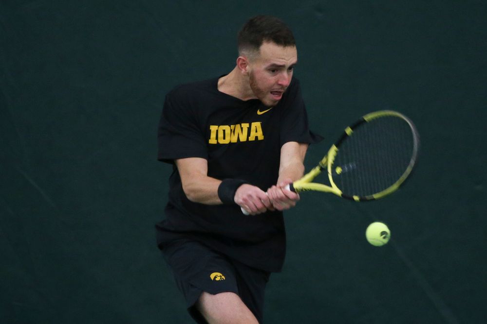 Iowa’s Kareem Allaf returns a hit during the Iowa men’s tennis meet vs VCU on Saturday, February 29, 2020 at the Hawkeye Tennis and Recreation Complex. (Lily Smith/hawkeyesports.com)