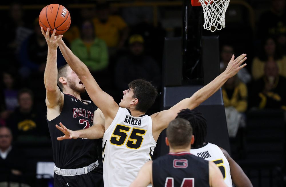 Iowa Hawkeyes forward Luka Garza (55) blocks a shot during a game against Guilford College at Carver-Hawkeye Arena on November 4, 2018. (Tork Mason/hawkeyesports.com)