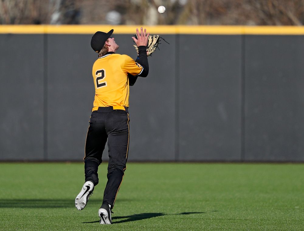 Iowa Hawkeyes shortstop Brendan Sher (2) pulls in a pop up for an out during the sixth inning of their game at Duane Banks Field in Iowa City on Tuesday, Apr. 2, 2019. (Stephen Mally/hawkeyesports.com)