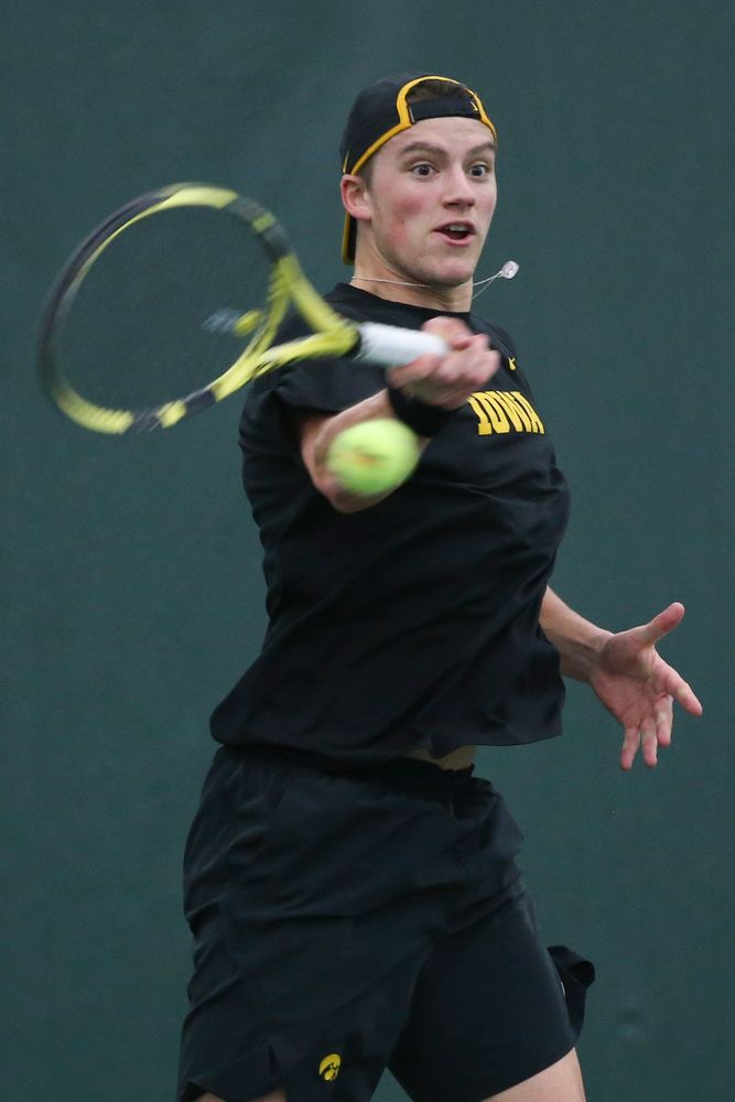 Iowa’s Joe Tyler returns a hit during the Iowa men’s tennis meet vs VCU on Saturday, February 29, 2020 at the Hawkeye Tennis and Recreation Complex. (Lily Smith/hawkeyesports.com)