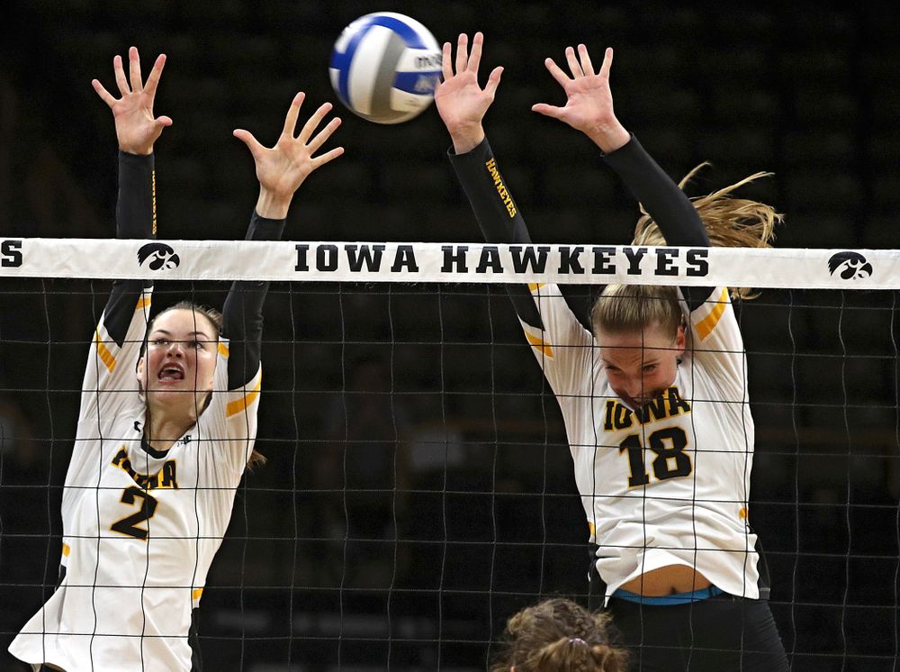 Iowa’s Courtney Buzzerio (2) and Hannah Clayton (18) block a shot during their Big Ten/Pac-12 Challenge match at Carver-Hawkeye Arena in Iowa City on Saturday, Sep 7, 2019. (Stephen Mally/hawkeyesports.com)