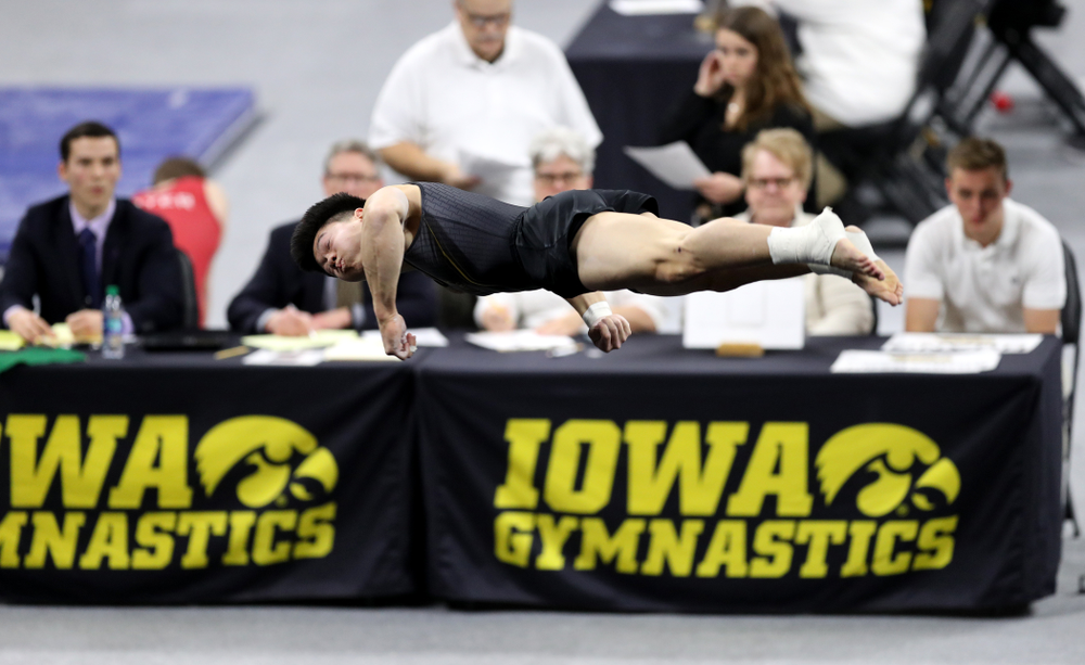 Iowa's Bennet Huang competes on the floor against Oklahoma Saturday, February 9, 2019 at Carver-Hawkeye Arena. (Brian Ray/hawkeyesports.com)