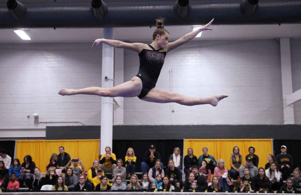 Mackenzie Vance competes on the beam during the Black and Gold intrasquad meet Saturday, December 1, 2018 at the University of Iowa Field House. (Brian Ray/hawkeyesports.com)