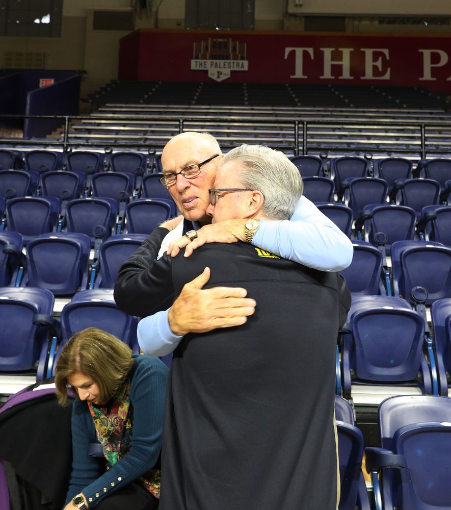 Iowa Hawkeyes head coach Fran McCaffery talks with Bob Weinhauer, his head coach from Penn, before practice at the Palestra Friday, January 3, 2020 in Philadelphia. (Brian Ray/hawkeyesports.com)