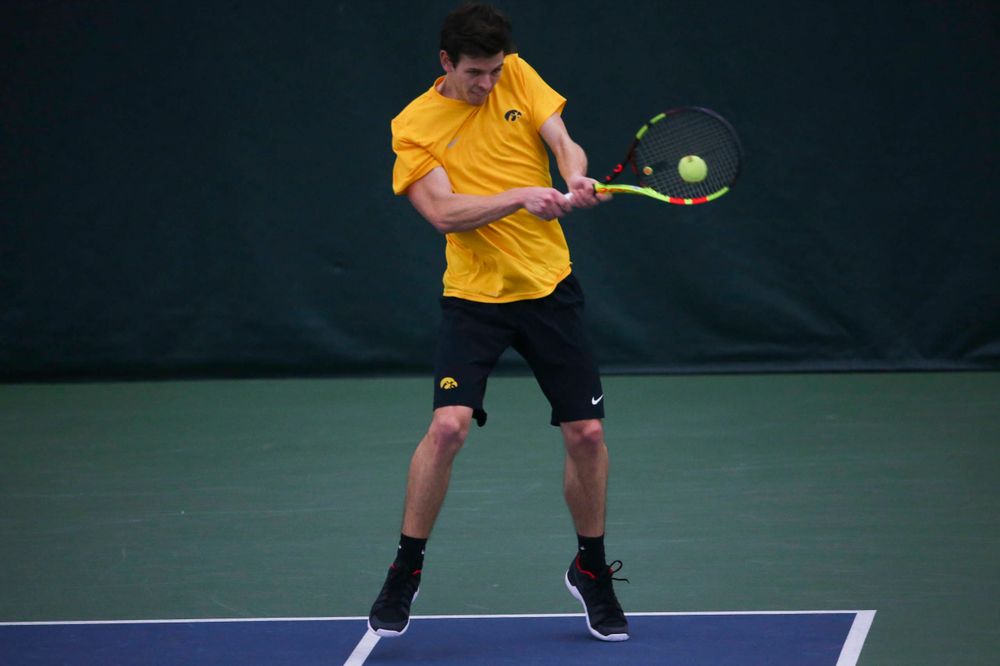 Iowa's Joe Tyler at a tennis match vs Drake Friday, March 8, 2019 at the Hawkeye Tennis and Recreation Complex. (Lily Smith/hawkeyesports.com)