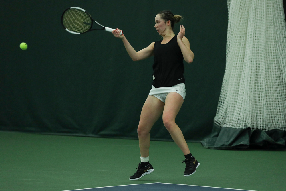 Iowa’s Samantha Mannix returns a hit during the Iowa women’s tennis meet vs DePaul on Friday, February 21, 2020 at the Hawkeye Tennis and Recreation Complex. (Lily Smith/hawkeyesports.com)