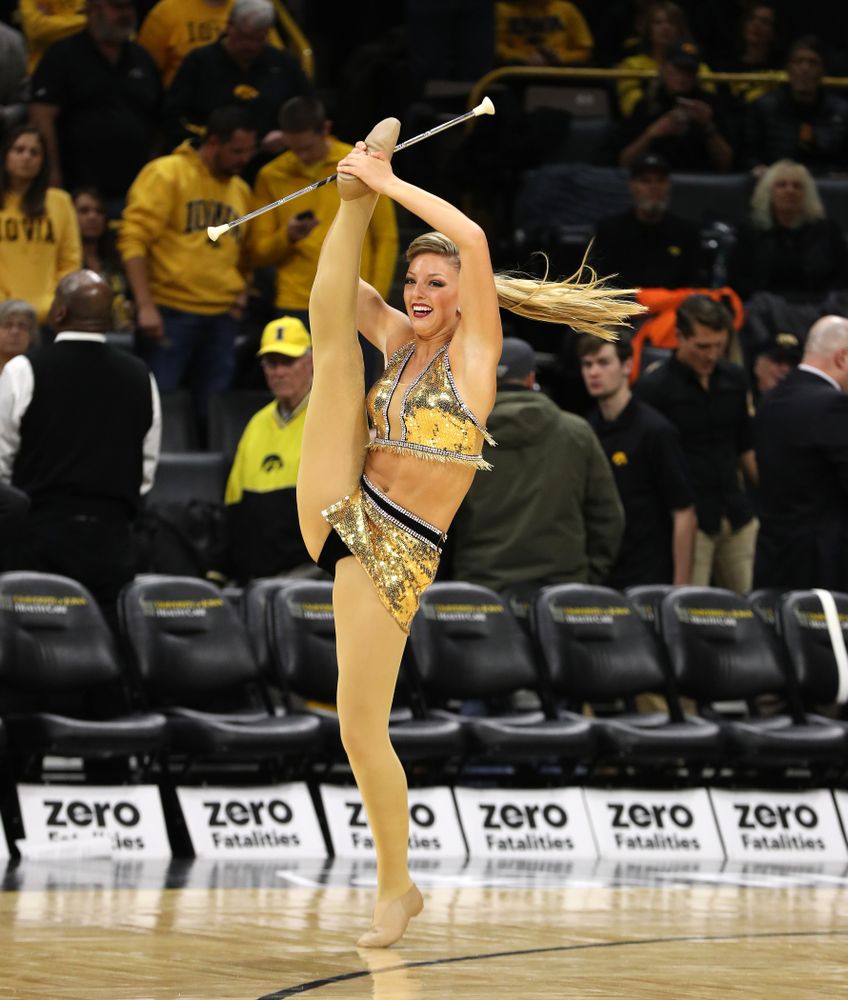 Hawkeye Marching Band Golden Girl ?Kylene Spanbauer performs at halftime of the Iowa Hawkeyes game against the Michigan Wolverines Friday, February 1, 2019 at Carver-Hawkeye Arena. (Brian Ray/hawkeyesports.com)