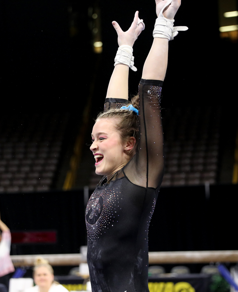 Iowa’s Mackenzie Vance competes on the bars against Michigan Friday, February 14, 2020 at Carver-Hawkeye Arena. (Brian Ray/hawkeyesports.com)