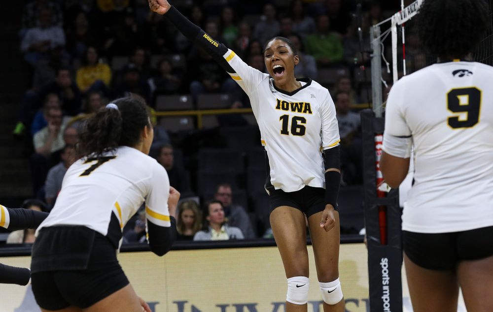 Iowa Hawkeyes outside hitter Taylor Louis (16) celebrates after winning a point during a match against Penn State at Carver-Hawkeye Arena on November 3, 2018. (Tork Mason/hawkeyesports.com)