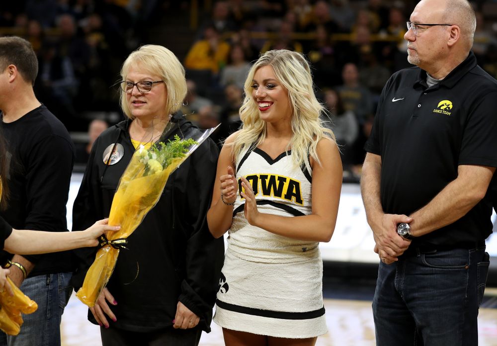 The Iowa Cheerleaders and Dance Team perform on senior night at half-time of the Iowa Hawkeyes game against the Purdue Boilermakers Tuesday, March 3, 2020 at Carver-Hawkeye Arena. (Brian Ray/hawkeyesports.com)