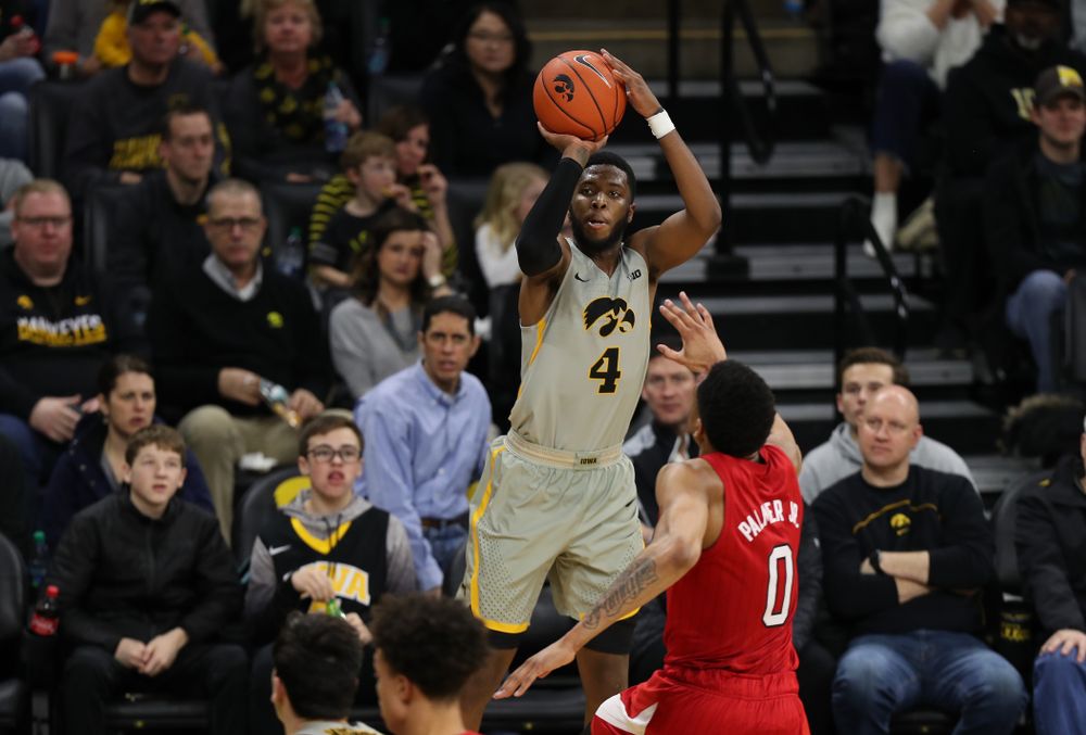 Iowa Hawkeyes guard Isaiah Moss (4) knocks down a three point basket against the Nebraska Cornhuskers Sunday, January 6, 2019 at Carver-Hawkeye Arena. (Brian Ray/hawkeyesports.com)