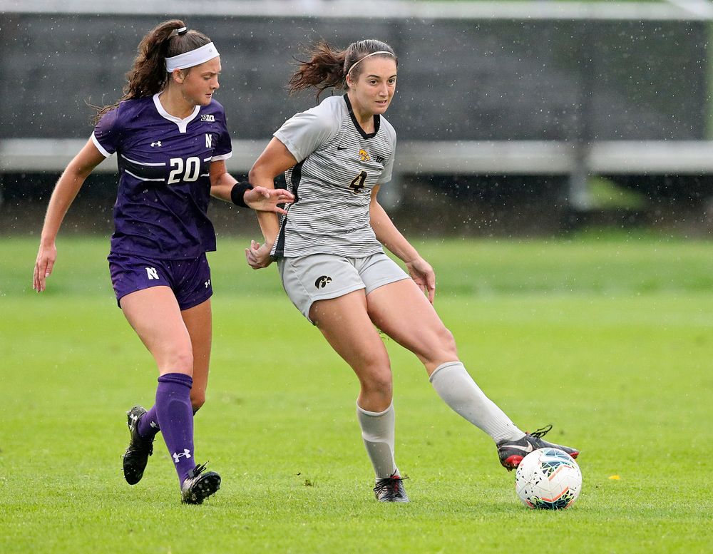 Iowa forward Kaleigh Haus (4) passes during the second half of their match at the Iowa Soccer Complex in Iowa City on Sunday, Sep 29, 2019. (Stephen Mally/hawkeyesports.com)